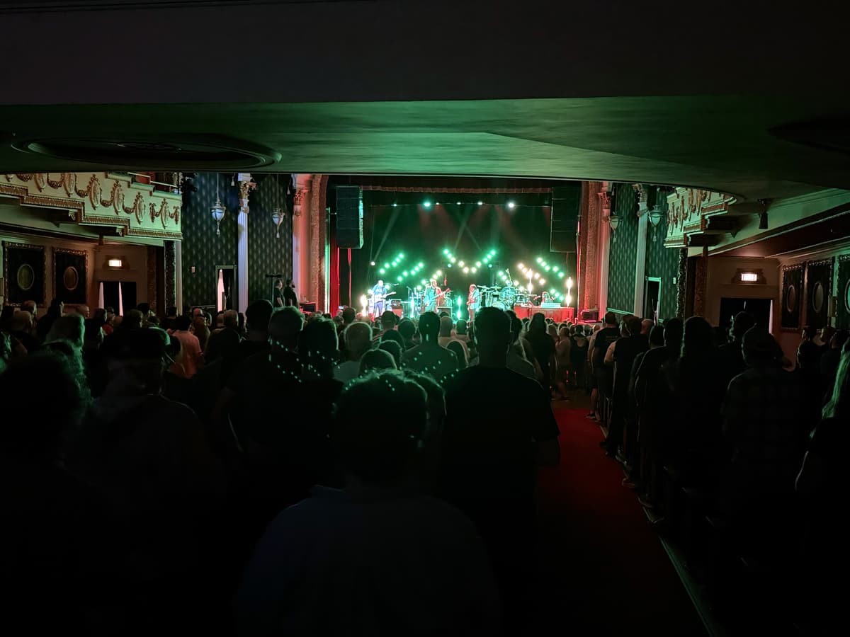 Concert with green stage lighting