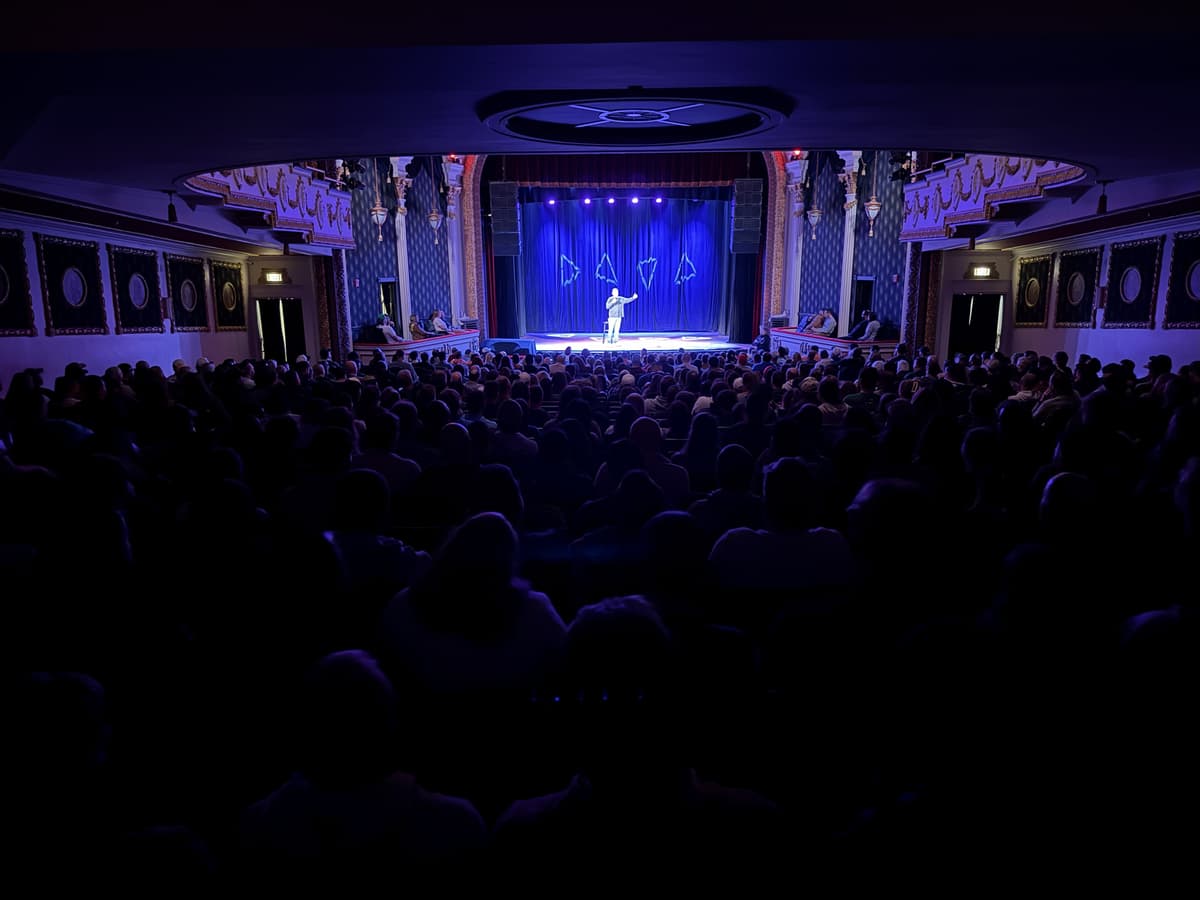 Theater performance with blue lighting
